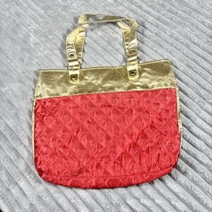Women's red quilted‎ tote bag with gold trim trimming
